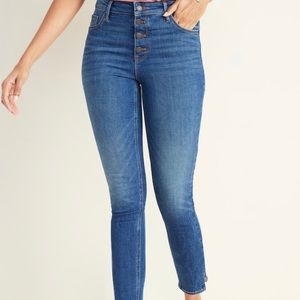 Pair of high wasted button up denim jeans